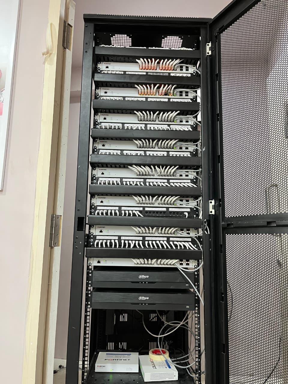 Network and server rack with patch panels